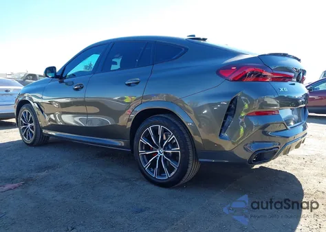 2022 BMW X6 xDrive40I z USA, uszkodzony, nr VIN 5UXCY6C09N9K72830